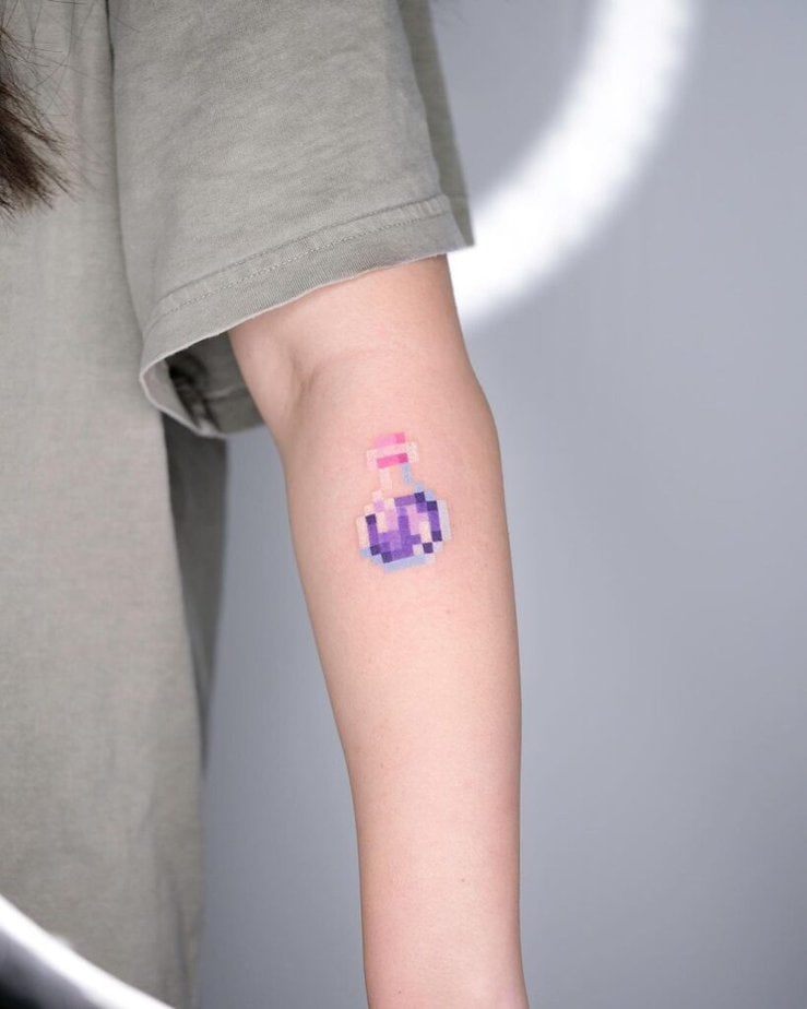 Purple potion bottle tattoo