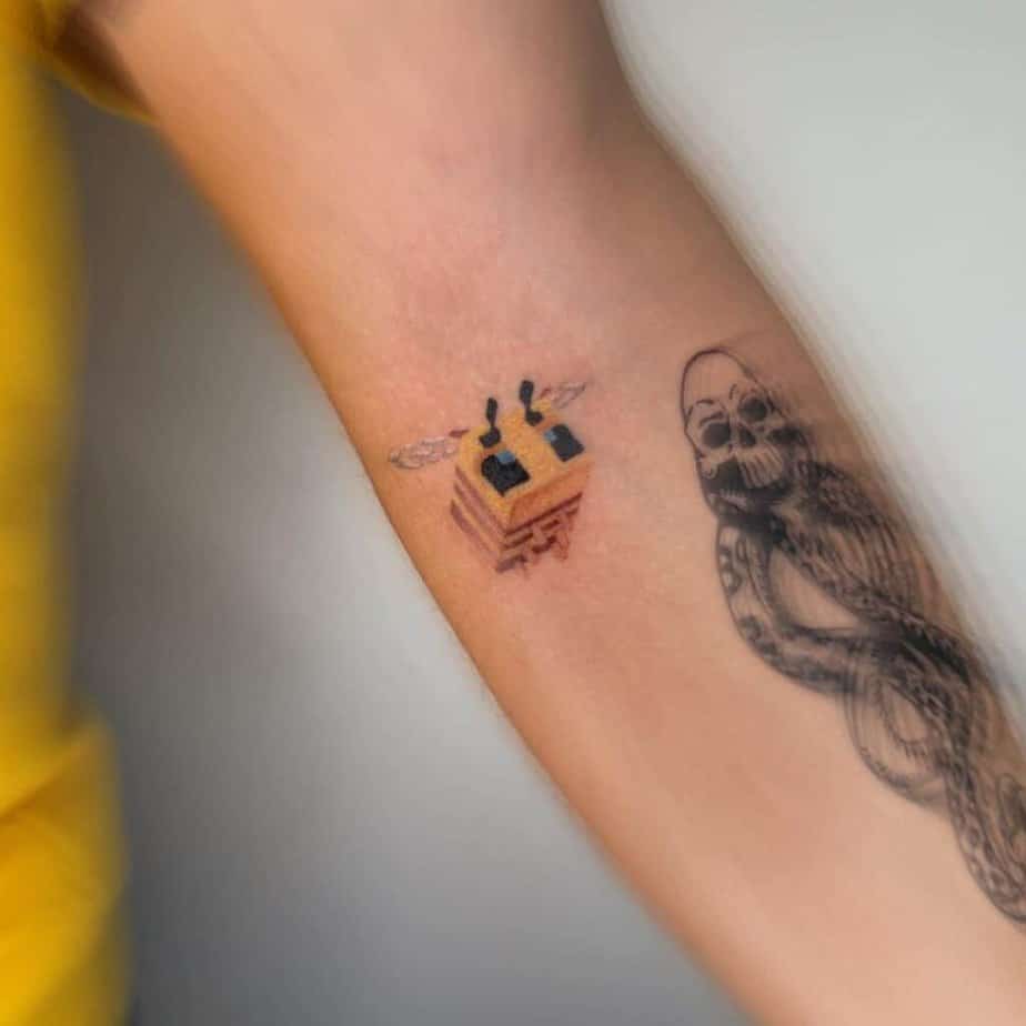 Pixel bee tattoo