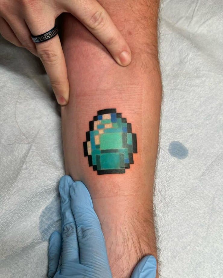 Small diamond tattoo inside arm