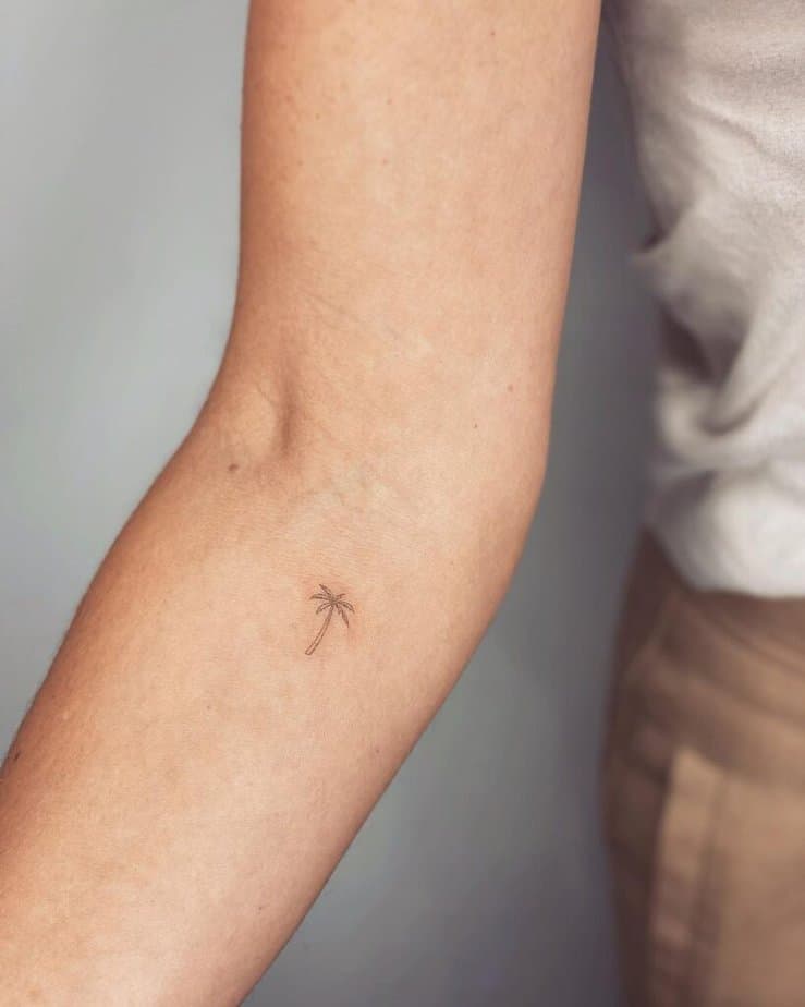 13. A tiny palm tree tattoo