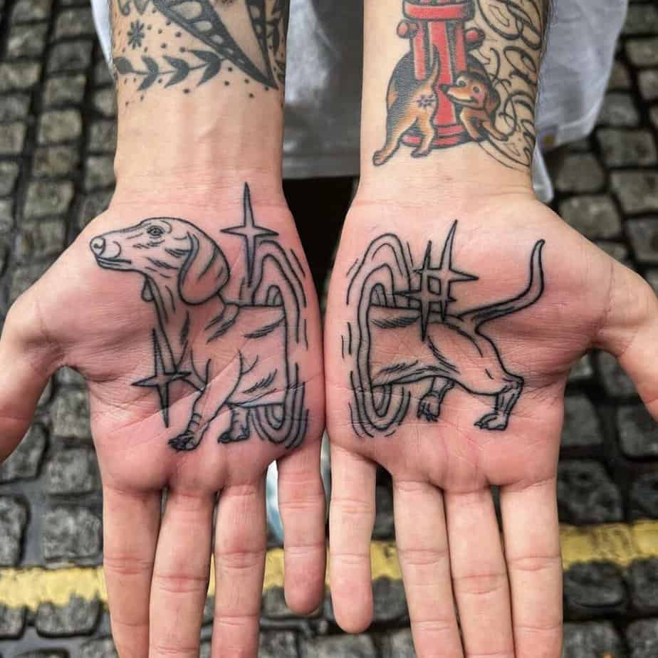 Sausage dog palm tattoo