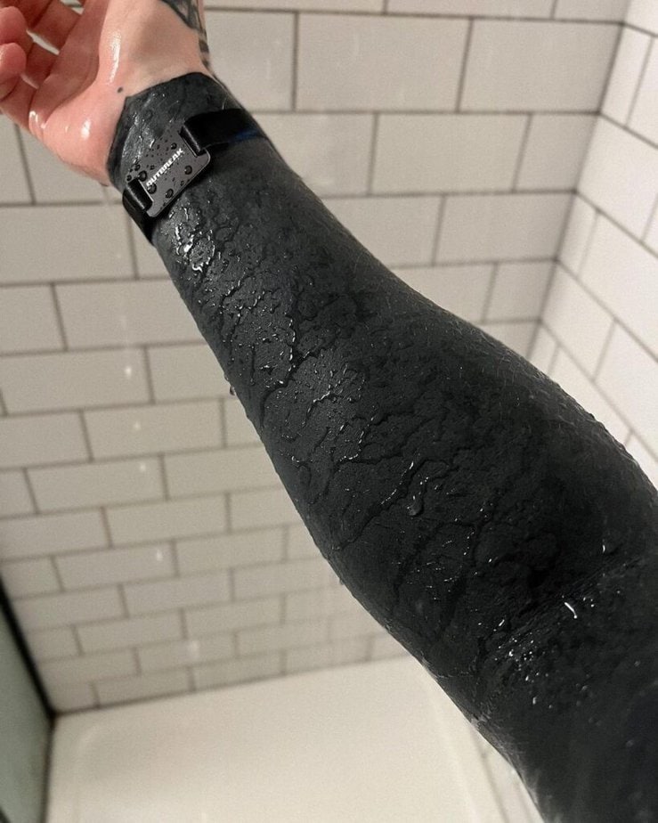 21. A full black sleeve tattoo