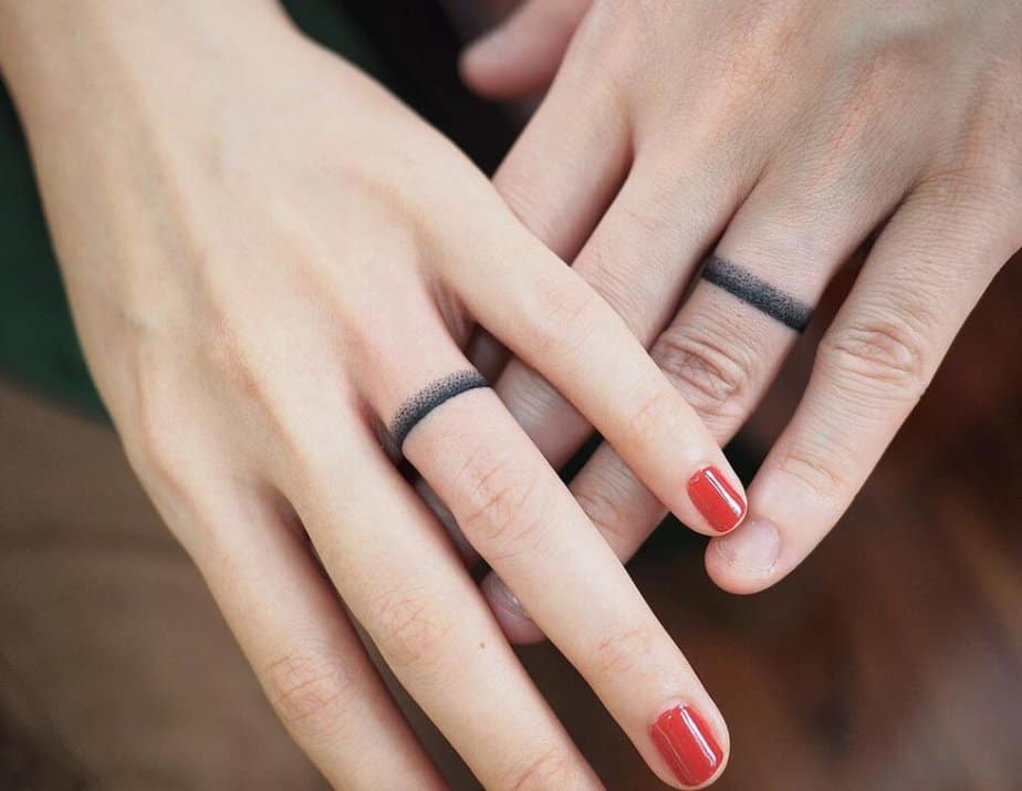 14. Elegant line wedding ring tattoos