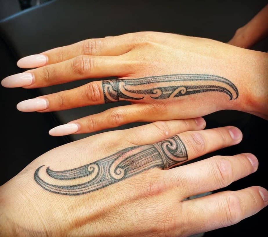 2. Koru wedding ring tattoos