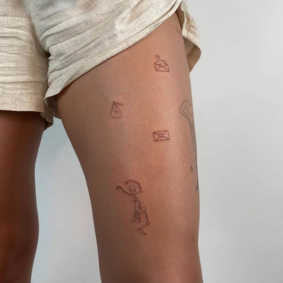 6. A simple patchwork tattoo on the thigh