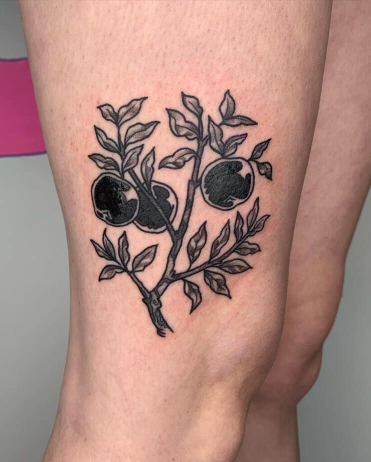 20. A contemporary apple tree tattoo