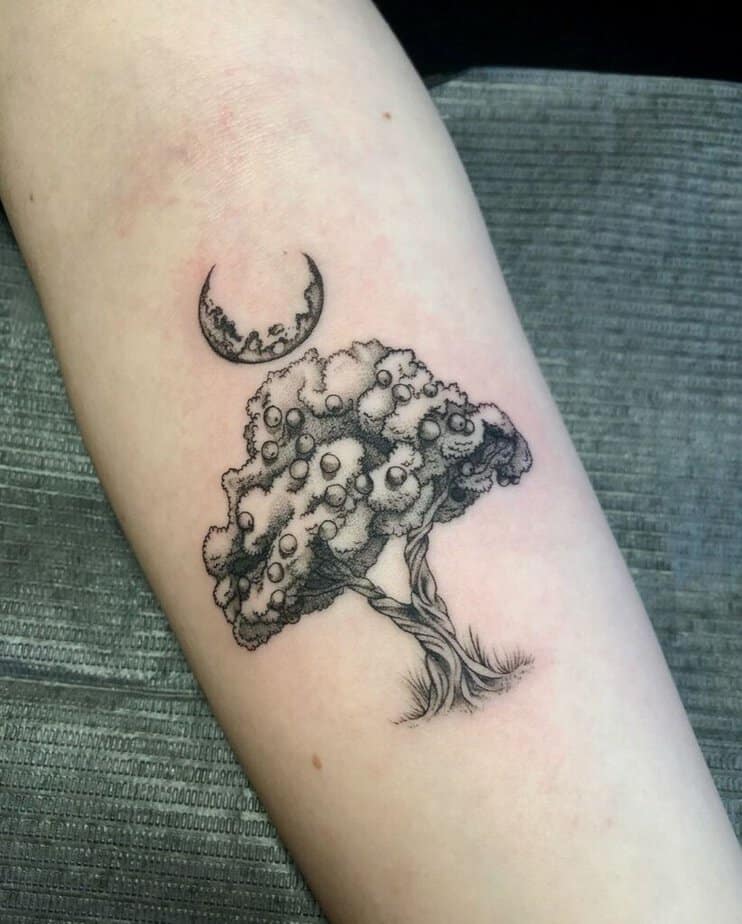 21. An apple tree tattoo under the moonlight