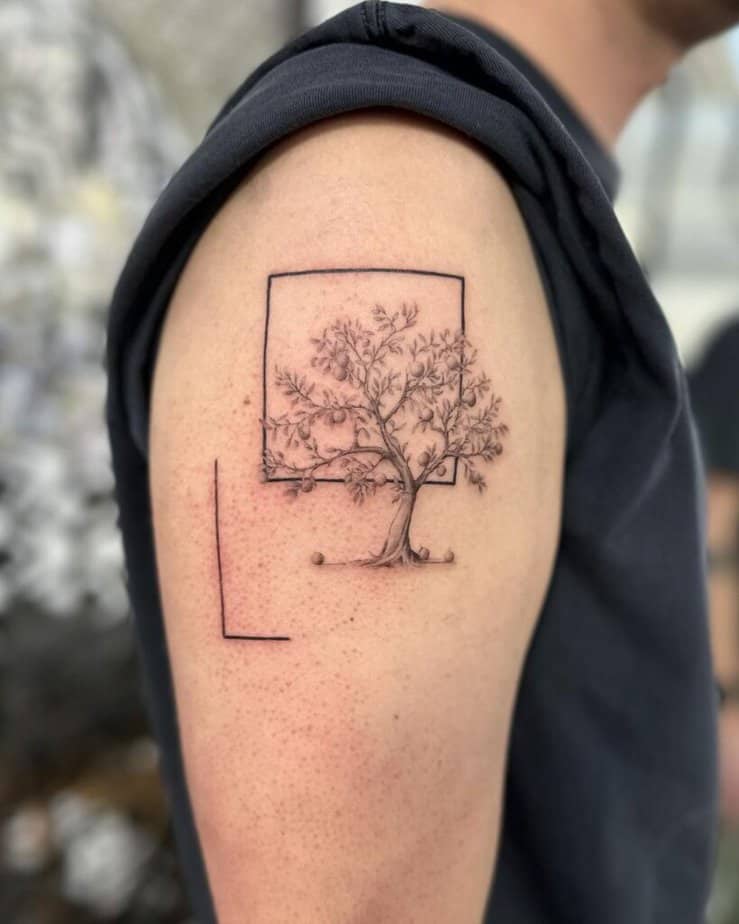9. An apple tree tattoo with geometric shapes