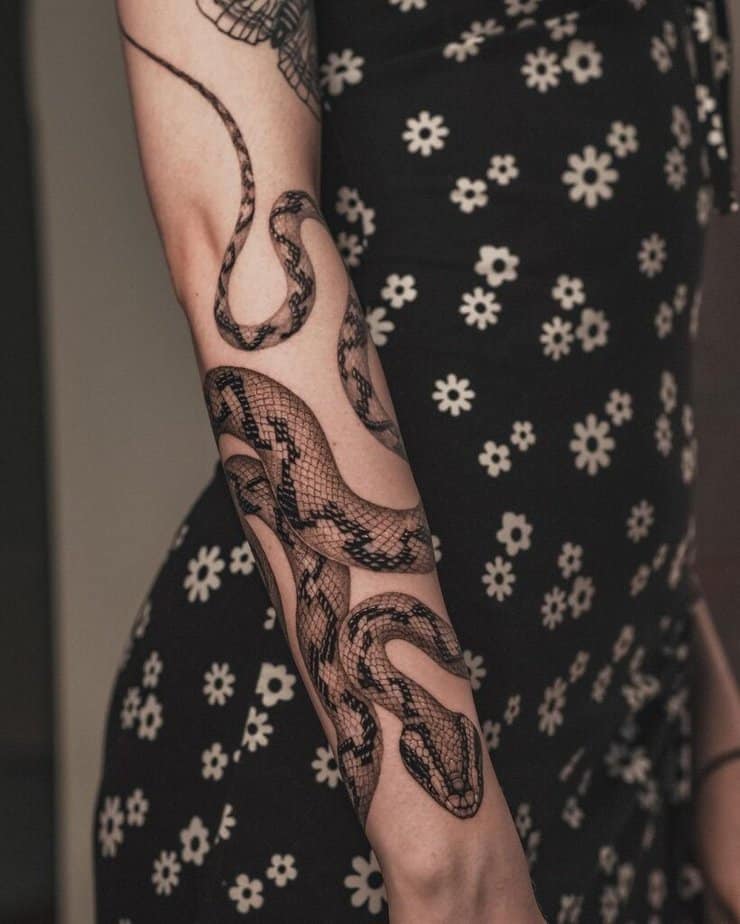 Snake forearm tattoo