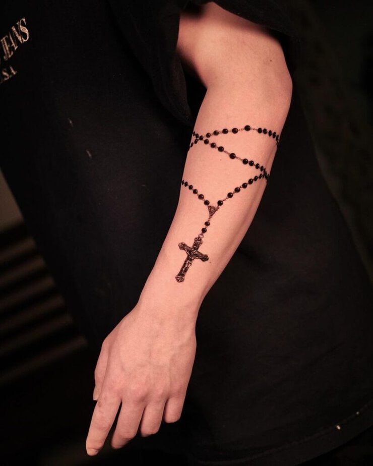 Rosary forearm tattoo