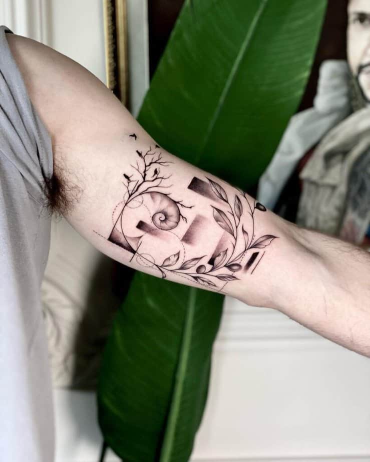12. A Fibonacci tattoo with leaves, branches, and birds