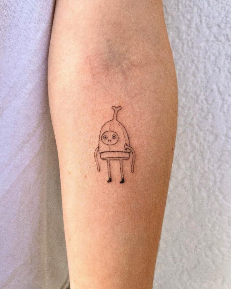 22. A banana man tattoo