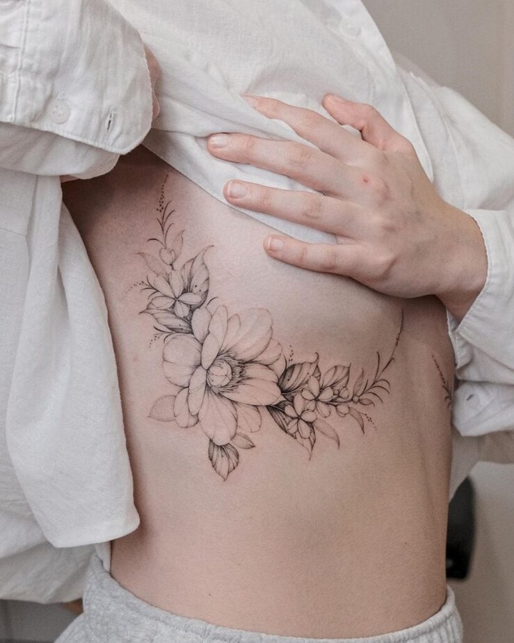 Floral under-breast tattoo ideas
