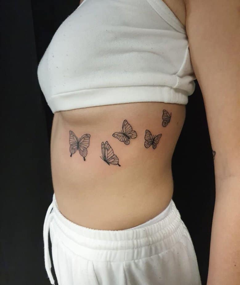 Insect tattoos for under the breasts