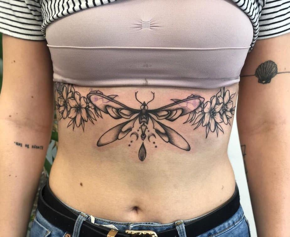 Insect tattoos for under the breasts
