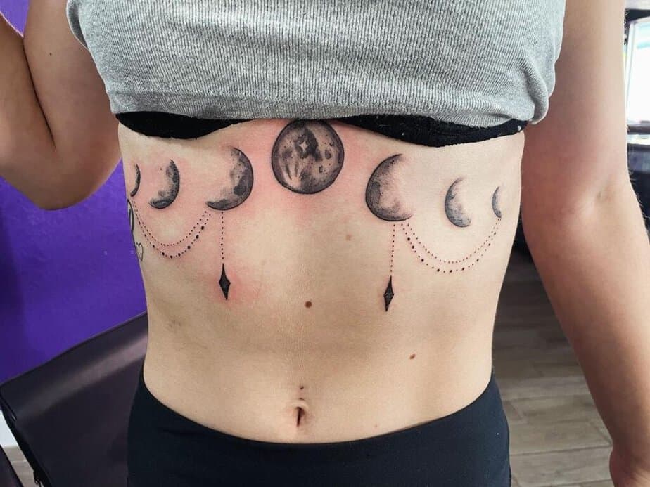 Unusual under-breast tattoo ideas