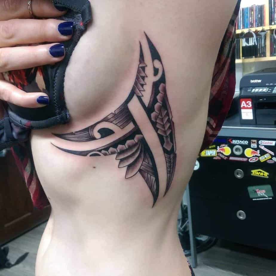 Unusual under-breast tattoo ideas