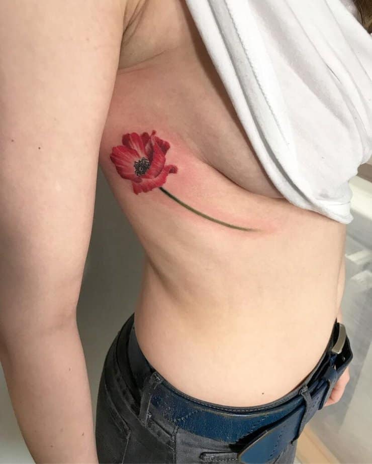 Colored under-breast tattoos