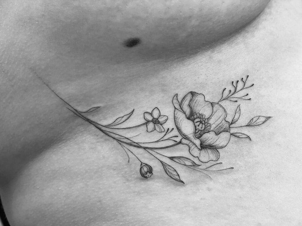 Floral under-breast tattoo ideas
