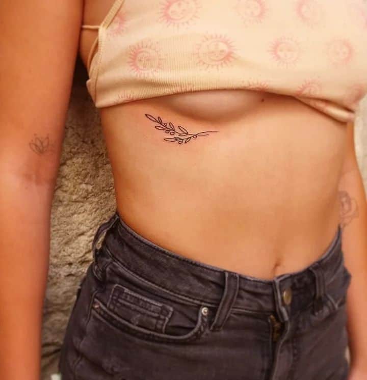 Floral under-breast tattoo ideas