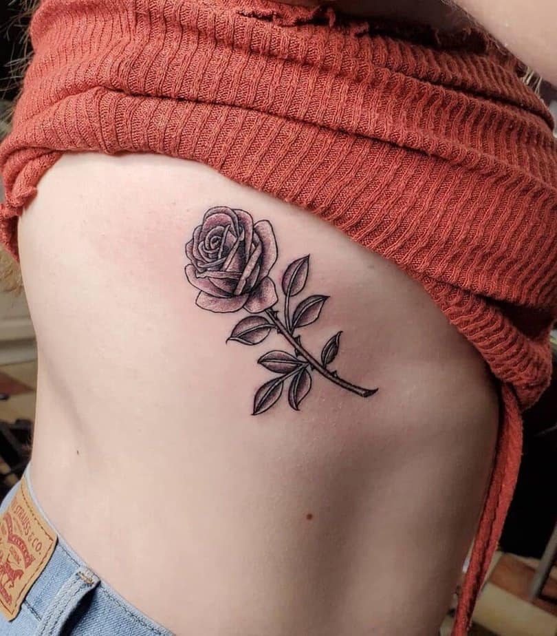 Floral under-breast tattoo ideas