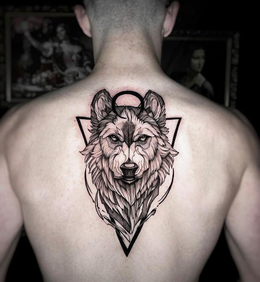 Geometric back wolf tattoo
