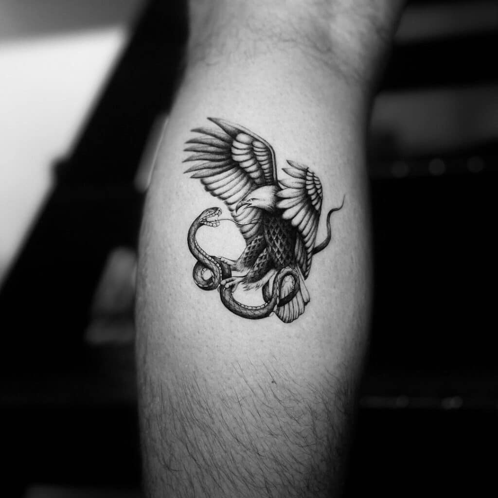 A tattoo of an eagle in action