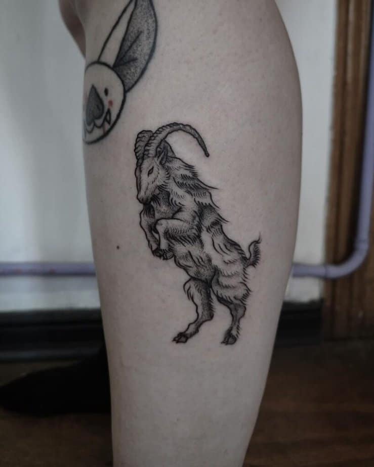 Black and gray goat tattoos