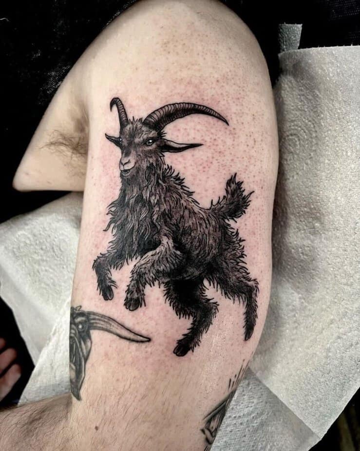 Black and gray goat tattoos