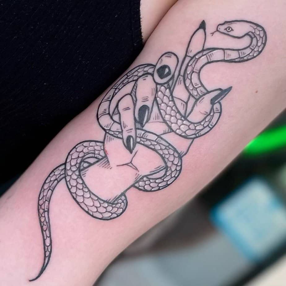 Simple witch hands tattoo