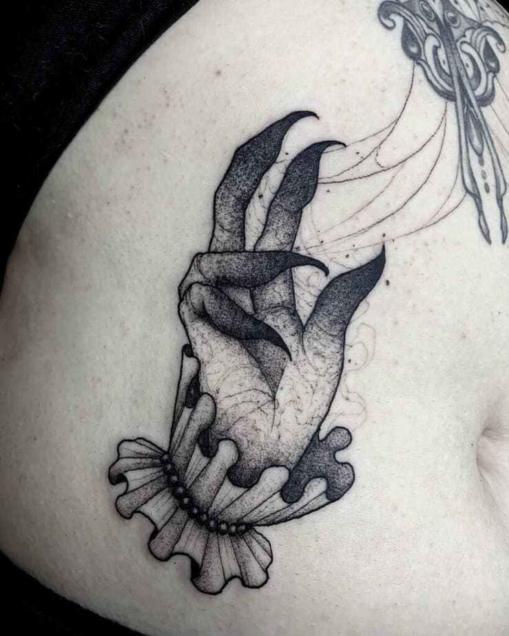Spooky witch hands tattoo