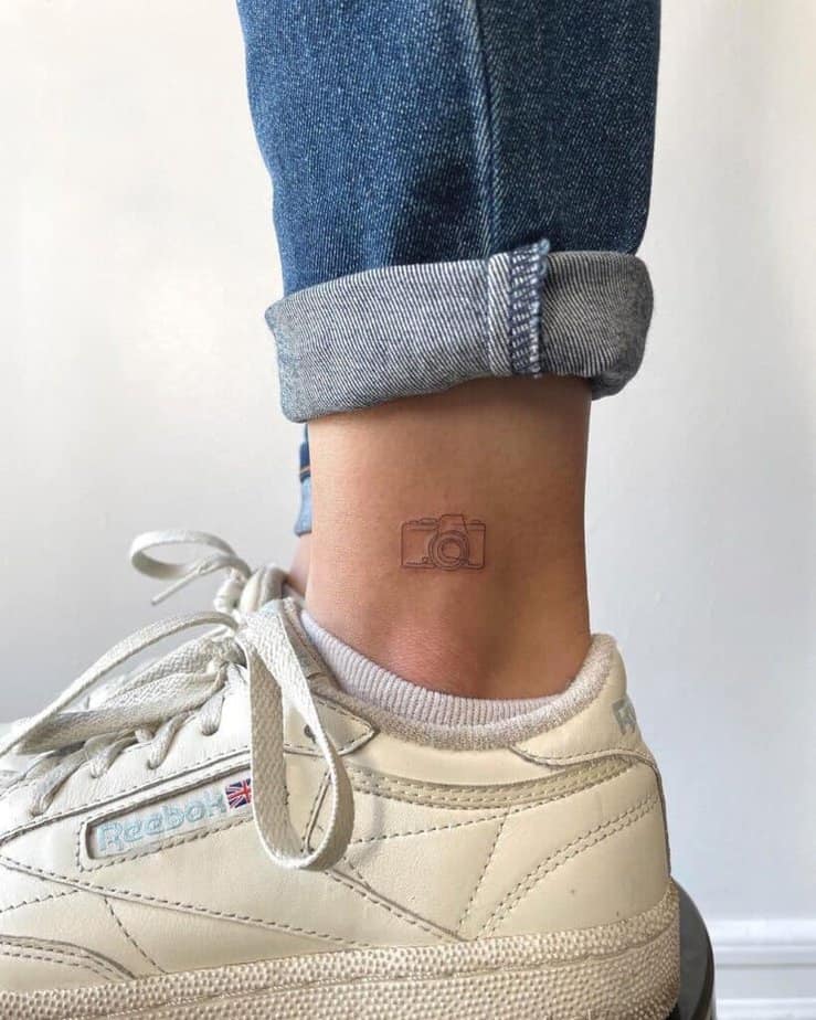 7. A cute camera tattoo