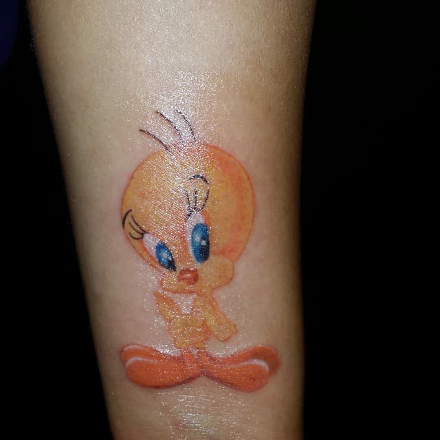 Full-color Tweety bird tattoo