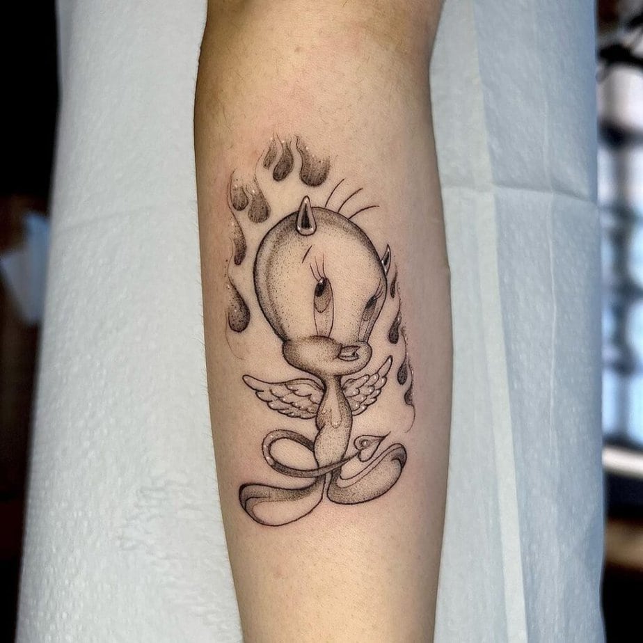 Black and gray Tweety tattoo