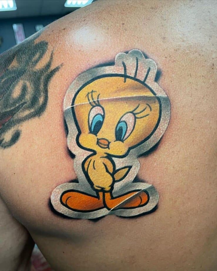 Full-color Tweety bird tattoo
