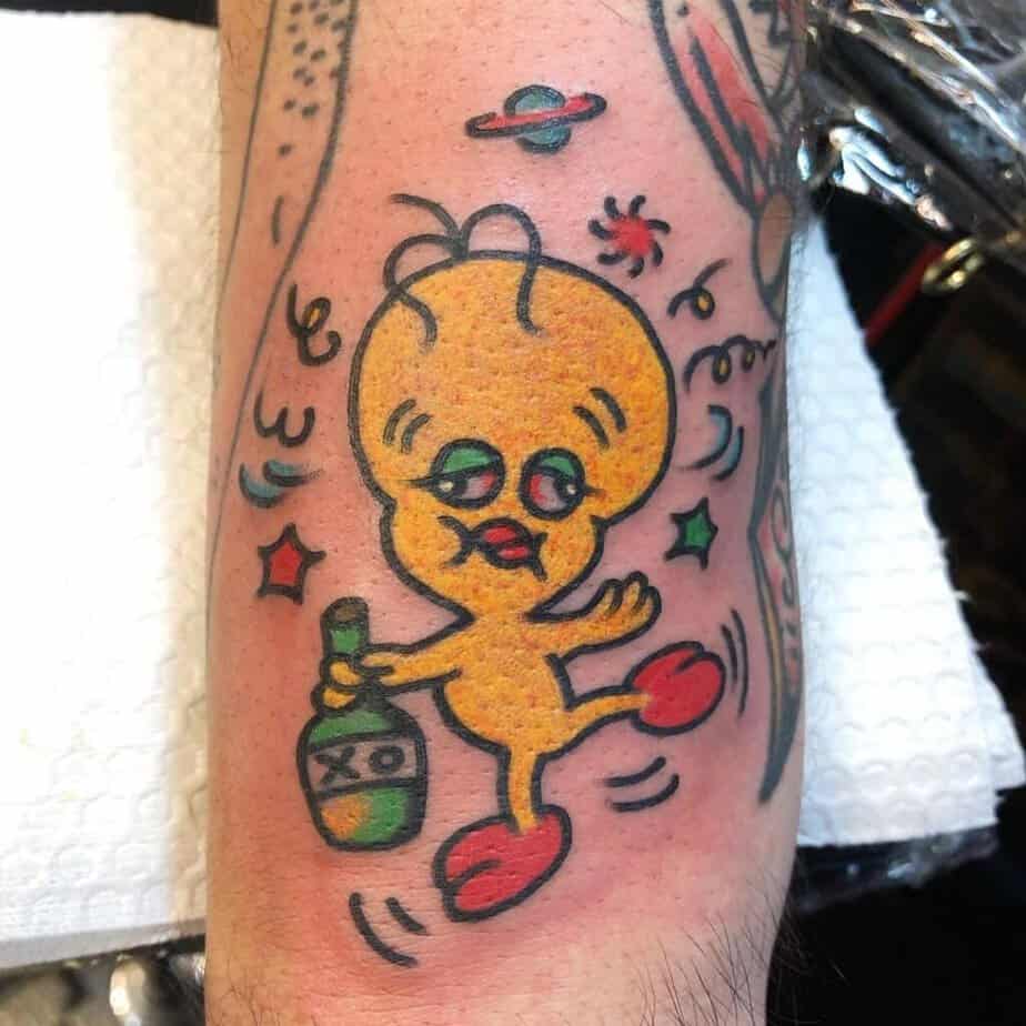 Full-color Tweety bird tattoo