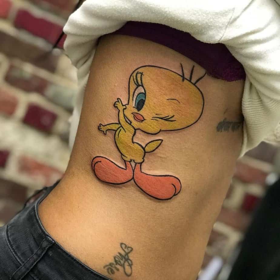 Full-color Tweety bird tattoo