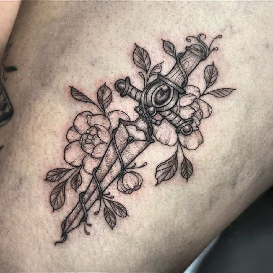 Fantasy dagger tattoo