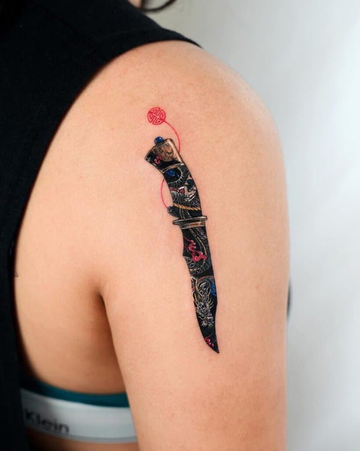 Feminine dagger tattoos