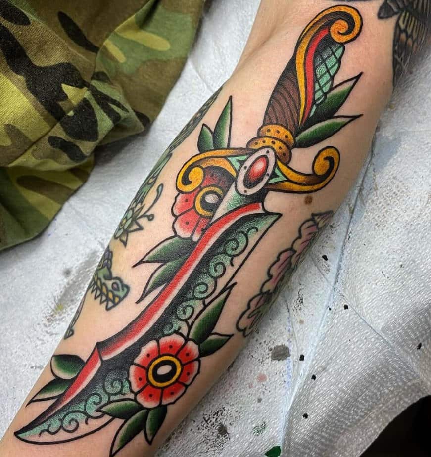 Color traditional dagger tattoo