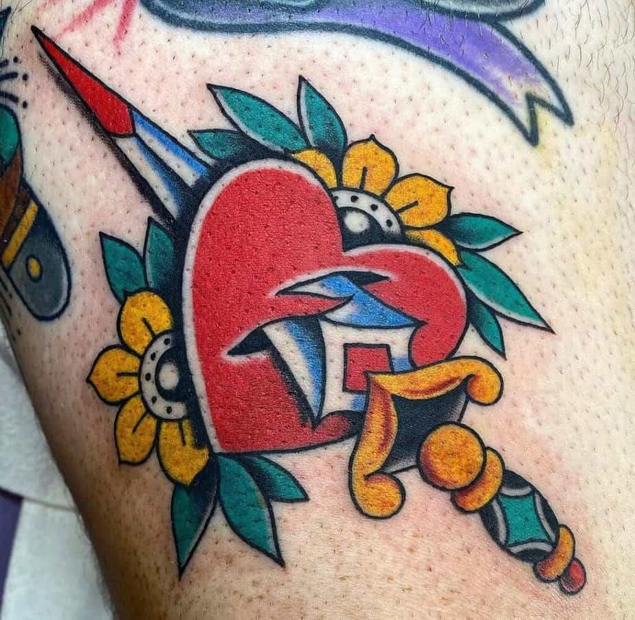 Color traditional dagger tattoo