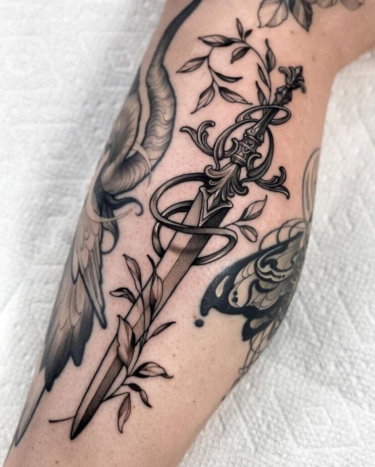 Fantasy dagger tattoo