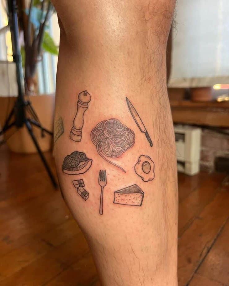 16. A tattoo of carbonara ingredients on the leg
