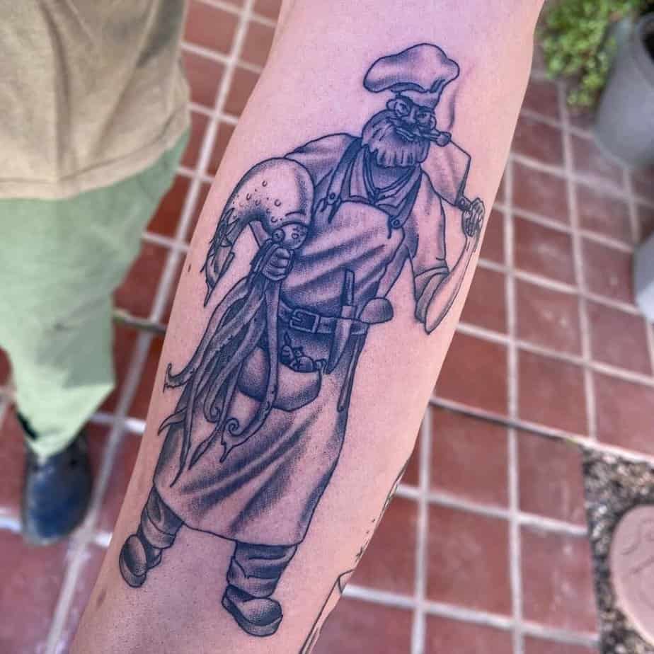 20. A tattoo of a chef on the forearm