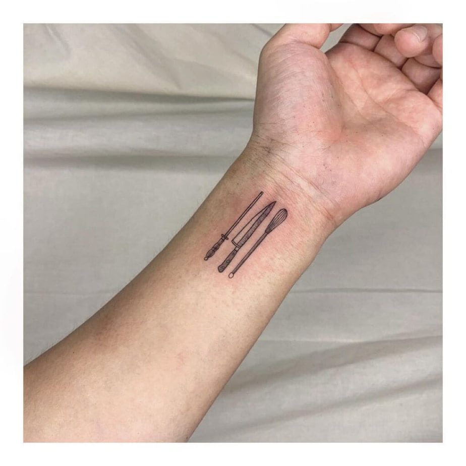 3. A tattoo of tiny tools on the wrist