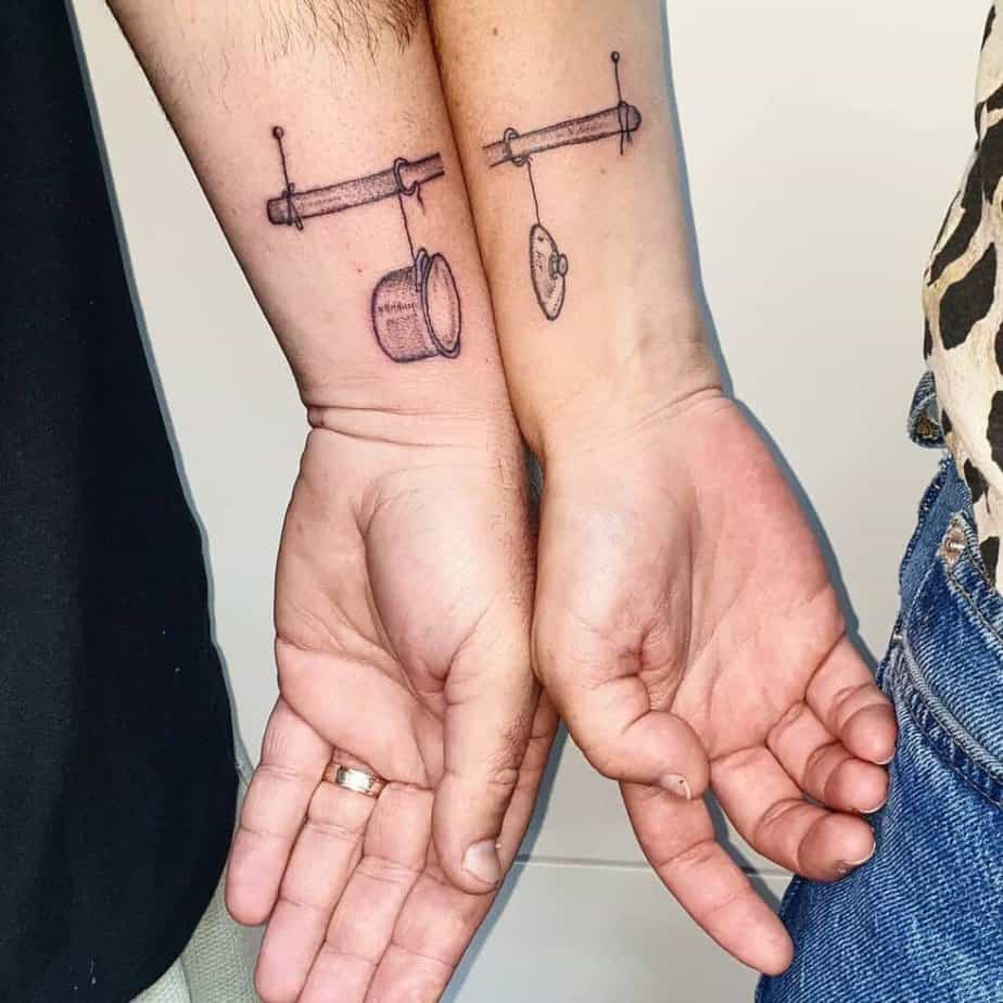 7. A matching tattoo of a pot and a lid