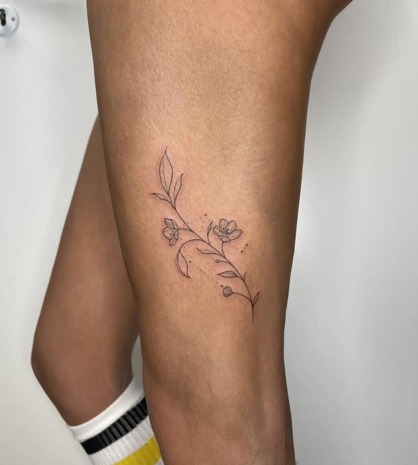 Libra fine-line tattoo on leg