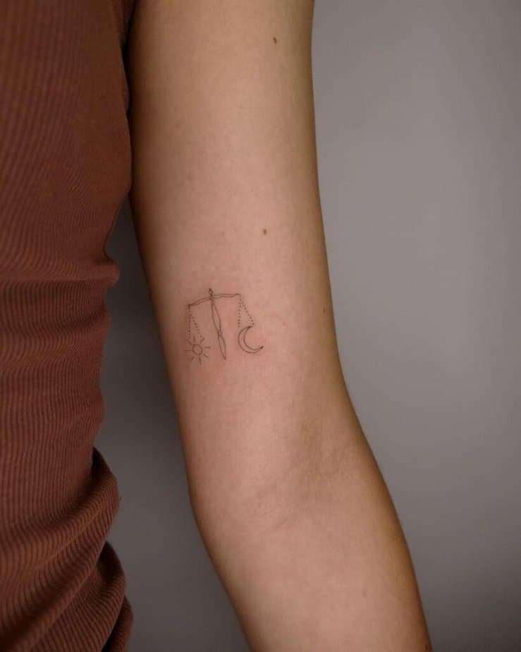 Libra tattoo with sun and moon