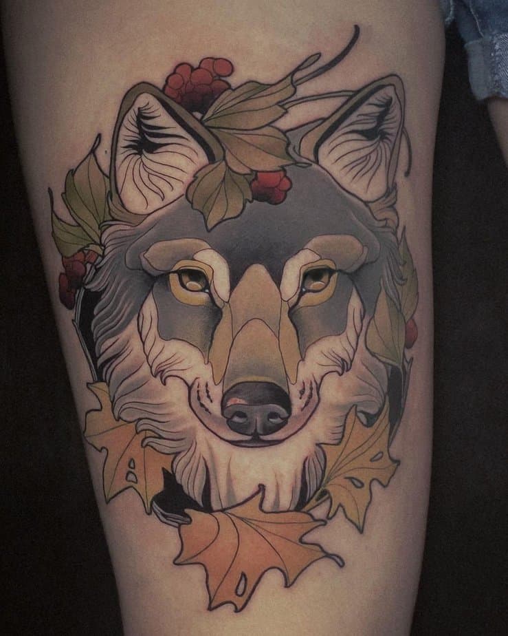 Wolf with autumn leaves tattoo
