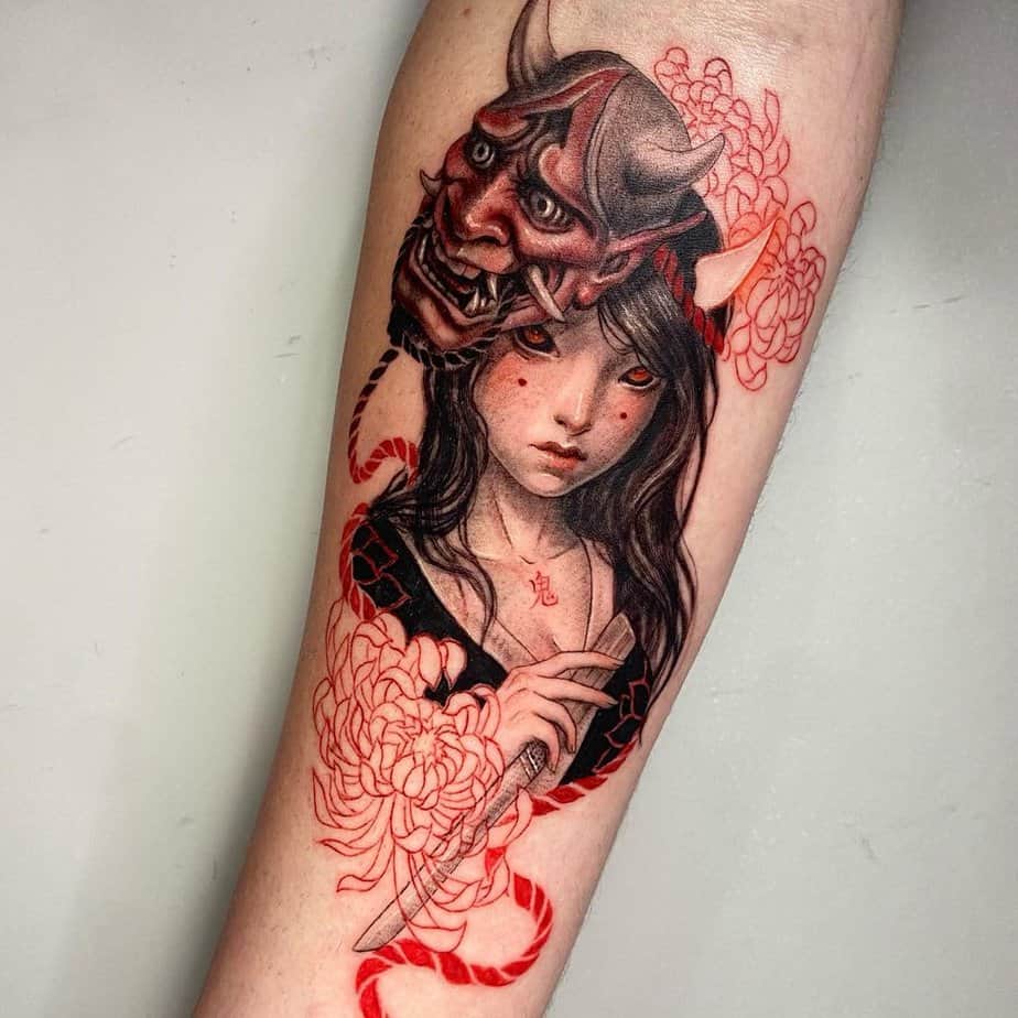 Hannya mask next to a beautiful woman, surrounded by red flowers